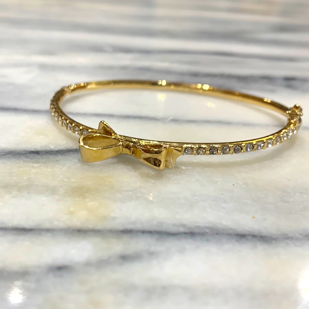 Kate Spade gold plated bow bangle